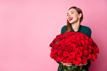 Photo Of Charming Lady Red Bright Lipstick Enjoy Large Hundred Roses Bouquet Boyfriend 8 March Present Laughing Nice Joke Wear Green Dress Isolated Pastel Pink Color Background