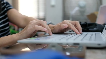 Wall Mural - woman typing keyboard, girl using computer for work, closeup finger 
