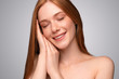 © kegfire - Delighted ginger model with hands under cheek