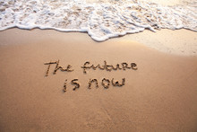 The Future Is Now, Innovative Technology Concept Text Written On Sand