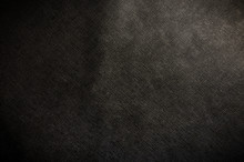 The Black Cattle Skin Texture With Empty Place For Text Top View, Background For Your Text. Flat Lay