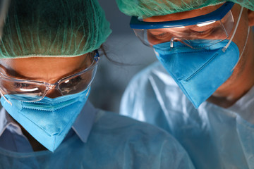 Wall Mural - Concentrated medical workers in work