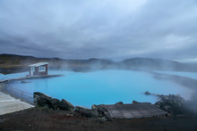 Hot Spring In The Open Air With A Gorgeous View. Blue Lagoon Thermal Bath In Iceland With Steam In Dusk Colourful Water. Hot Geothermal Pool Of Hverir Myvatn Lake. Iceland Blue Water Steam
