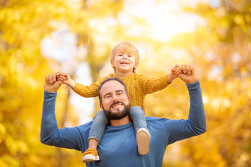 Sticker - Happy family having fun outdoor in autumn park