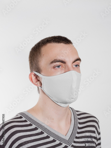 Fotomural masked man coronovirus on an isolated background