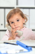 © aletia2011 - Cute little girl using phone in office