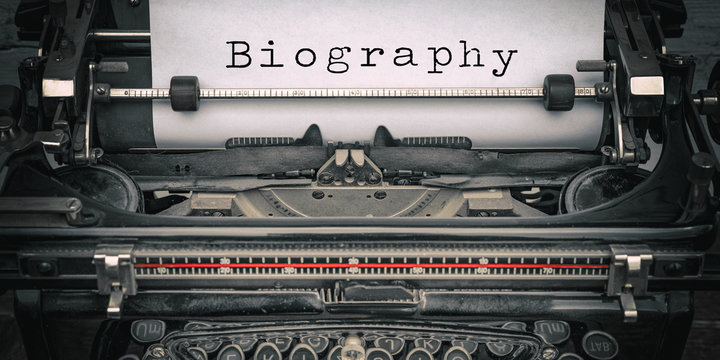 Biography background - Old retro vintage close-up of a typewriter with the words 
