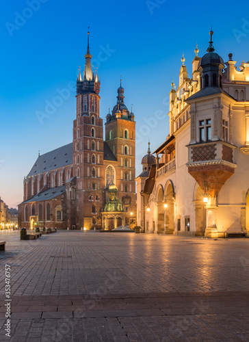 Main market square, Cloth Hall and St Mary's church in the night, Krakow, Poland © tomeyk