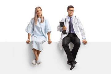 Poster - Male doctor and a female patient sitting on a blank panel