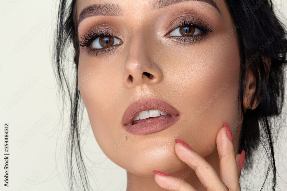 a beauty brunette woman portrait brown eyes make up