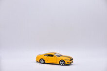 Yellow Toy Car On White Background