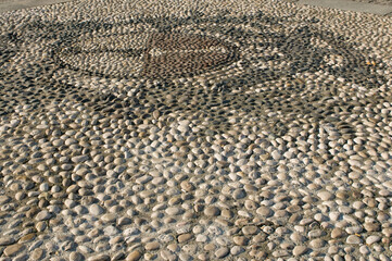 Road made of stone antique Turin, Chivasso, Italy.