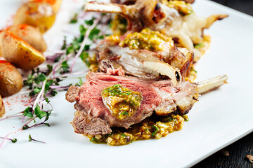 Wall Mural - Closeup on gourmet fried lamb chops with sauce 