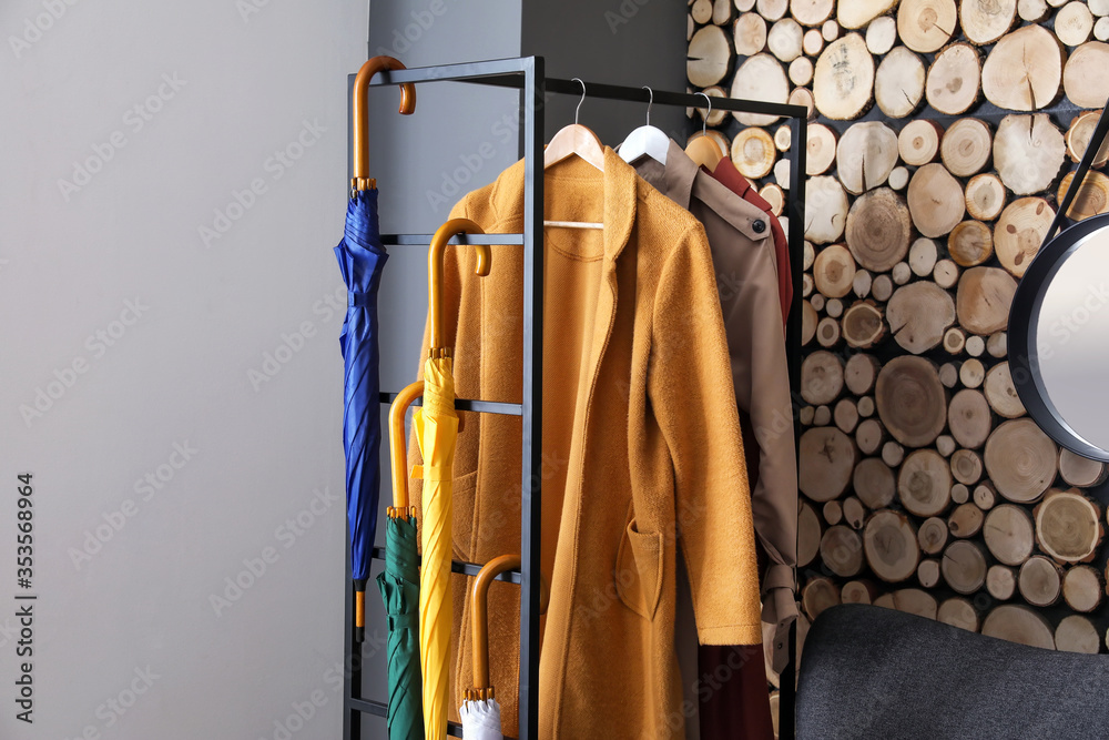 Stylish interior of modern hall with umbrellas