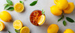 Ice tea with fresh lemons. Grey background. Top view.