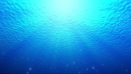 under water abstract blue sea or ocean background with cute bubbles going up from below and sun beam