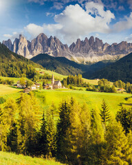 Fototapete - Countryside view of the Funes valley St. Magdalena or Santa Maddalena in the National park Puez Odle or Geisler. Dolomites, South Tyrol. Location Bolzano, Italy, Europe. Dramatic scene. Beauty world.
