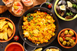 assorted of spanish dish- paella, mussel, tapas