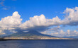 port of city of Naples with Vesuvius vulcan in background with cloudy blue sky, Napoli Italy            