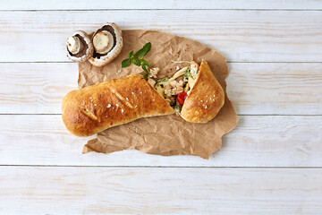 STROMBOLI, Chicken Pesto Stromboli (chicken, mushrooms, mozzarella & sauce)