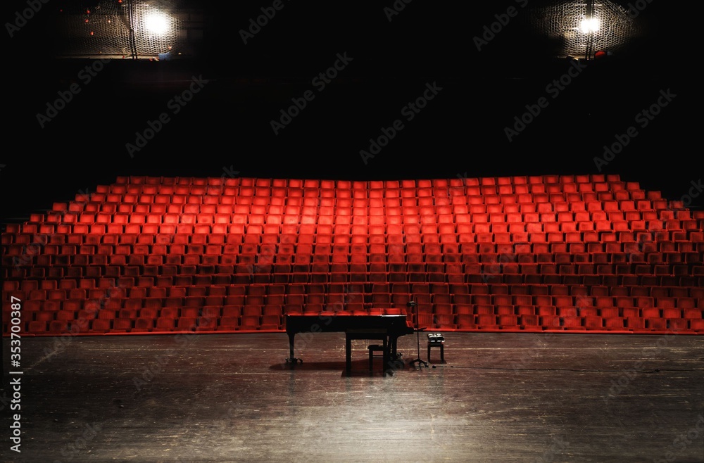 Empty concert hall or theater seats and piano on stage - obrazy, fototapety, plakaty 