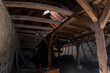 © DorSteffen - Interior of large old wooden German Barn during renovation, looking up from the ground floor