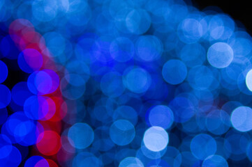 Background lights in defocus of different colors.