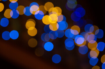 Background lights in defocus of different colors.