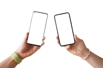 man hands holding side by side two smartphones. comparing, analyzing or matching two new smartphones