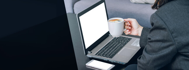 Poster - mockup laptop screen with businesswoman holding coffee cup,Digital Business disruption or marketing trending.digital transformation.banner background leave space for display design