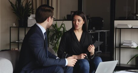 Wall Mural - Confident caucasian company executive consulting, handshaking indian female employee, intern or business partner making agreement. Diverse businessman and businesswoman shake hands at office meeting.