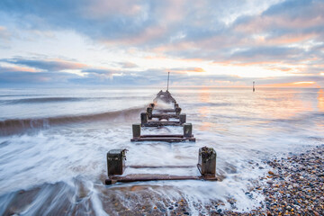 Coastal Seascape at Hornsea on the dramatic East Yorkshire coast, fantastic adventure travel destination or holiday vacation to view picturesque scenery at sunrise or sunset