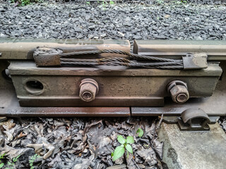 Old rail joint on railway, close up.