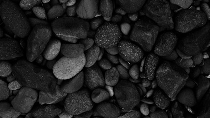 Wall Mural - black pebble stone texture background