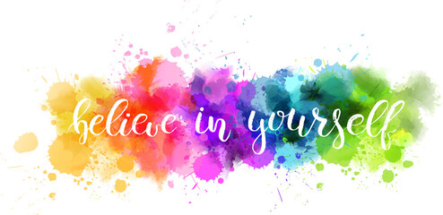 Typography watercolored background with handwritten inspirational text : Believe in yourself