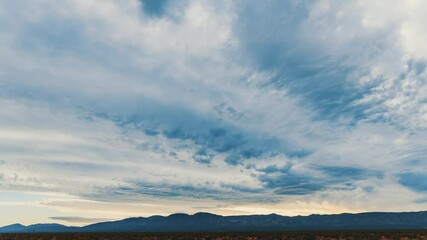 Wall Mural - time lapse clouds over the Mojave desert