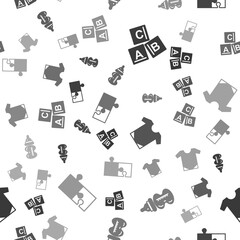 Sticker - Set ABC blocks, Baby bottle, Baby onesie and Piece of puzzle on seamless pattern. Vector.