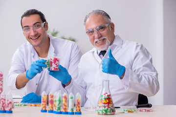 Two chemists working in the lab