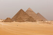 The pyramids of Giza; Menkaure, Khafre, and Khufu