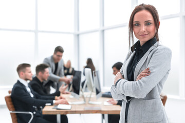 young business woman standing in the office