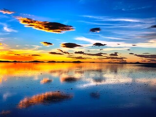 Wall Mural - amazing sunset over a dry salt lake in Uyuni Bolivia