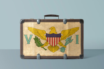 Wall Mural - United States Virgin Islands flag on old vintage leather suitcase with national concept. Retro brown luggage with copy space text.