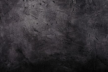 Black Marble Or Concrete Background (as An Abstract Background Or Stained Marble Or Concrete Texture)