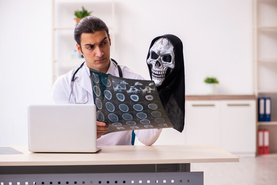 Male devil doctor radiologist working in the clinic