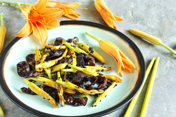 Sticker - Asian dish with daylily flowers (golden needles) and woody ear mushrooms with sesame seeds. Chinese cuisine. daylily buds, edible flowers, foraging. daylily recipe