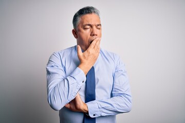 Sticker - Middle age handsome grey-haired business man wearing elegant shirt and tie bored yawning tired covering mouth with hand. Restless and sleepiness.