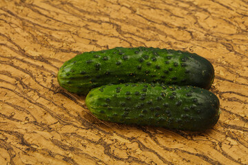 Ripe fresh green two cucumbers