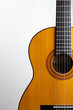 © effjott.art - Acoustic guitar placed on the right side in portrait format on a light background