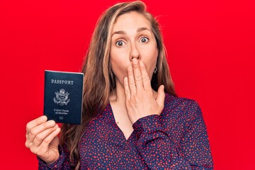 Canvas Print - Young beautiful blonde woman holding passport of united states of america covering mouth with hand, shocked and afraid for mistake. surprised expression