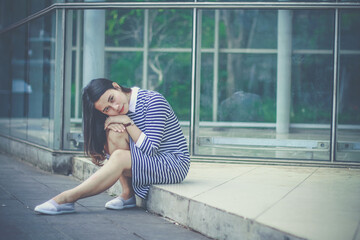 Wall Mural - Lady in the park with casual dress